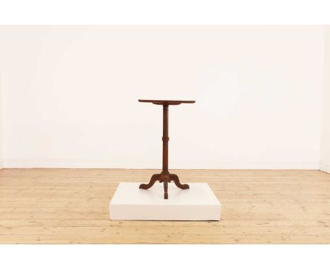 A William IV rosewood wine table by Charles Hindley &amp; Sons,c.1830, the shaped rectangular top with a gadrooned edge, bear