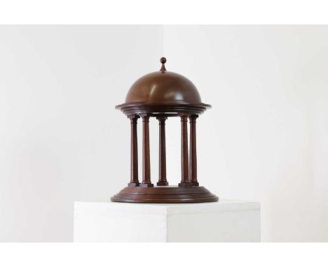 A wooden architectural model,20th century, modelled as a country house folly,25cm diameter34cm highProvenance: Montpelier Int