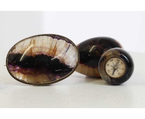 A small group of Derbyshire Blue John pieces, 19th/20th century, comprising a miniature compass, a scent bottle, two eggs and