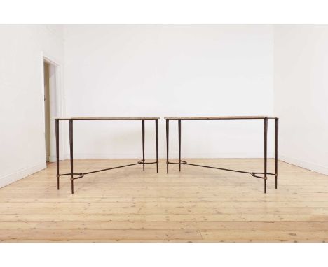 A pair of patinated metal and marble console tables,of recent manufacture, each with a rectangular marble top, raised on squa