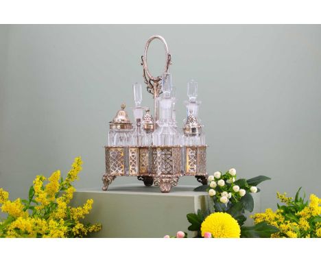 A Victorian silver condiment stand,by Henry Wilkinson &amp; Co., Sheffield 1855,the pierced stand with eight bottles, two wit