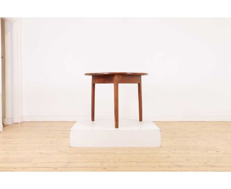 A large oak cricket table,19th century, with a circular top raised on tripod supports,86cm diameter67cm highProvenance: Montp