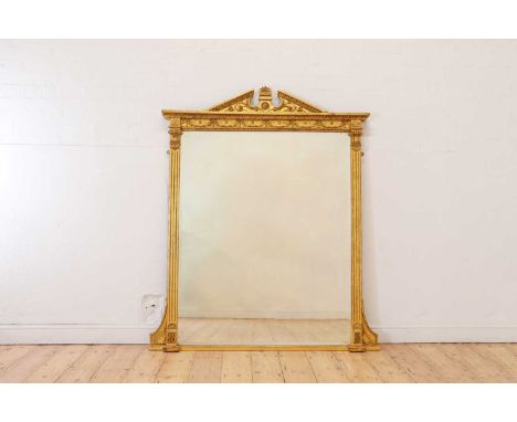 A George III-style carved giltwood and gesso overmantel mirror, late 19th century, of architectural form with a bevelled glas