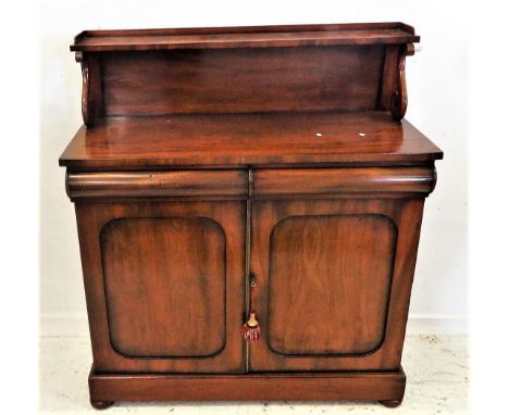 Late Regency 2 Door Mahogany Chiffonier on plinth base with flattened bun supports, pair panelled doors, 2 bow fronted drawer