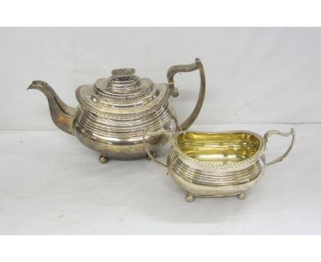 Georgian Silver Teapot with oval body, ribbed upper section with continuous leaf mouldings, spout decorated with shell & leaf