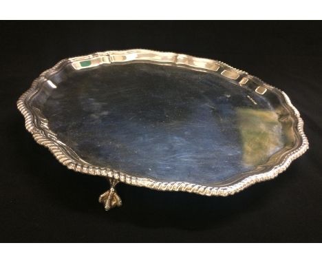 Large Silver Salver with wavy gadroon rim on 3 ball & claw supports, maker BD Sheffield 1971, approx. 12" Dia. 