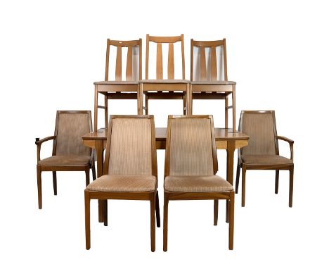 Mid century Nathan beech wood extending dining table and four chairs with three additional chairs. H 72.5, L 140cm extending 