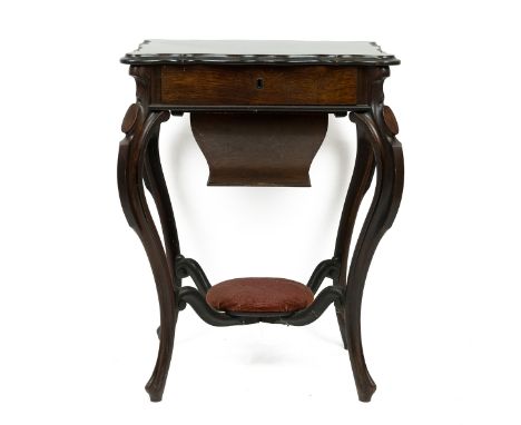 Edwardian rosewood sewing table with sliding top opening to reveal a drawer fitted with boxwood compartments wit rosewood lid