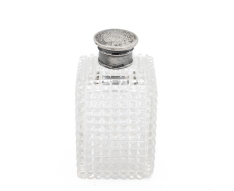 Cut glass cologne flask with silver screw top of square form with diamond cut pattern. H 9.5cm.