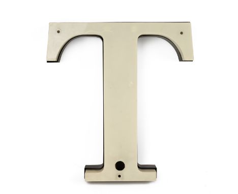 Vintage advertising letter "T" in plastic with metal backing and neon tube lighting. Height 50cm, width 46cm.