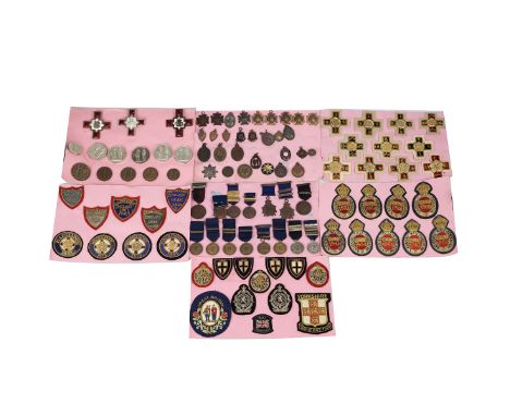 Collection of Rifle Association badges, cloth patches and medals c1850s- 1960s . Badges and medals include NRA Bisley, Scotti