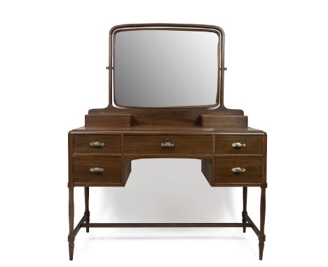 Early 20th Century teak Dressing Table with swing toilet mirror and two drawers to top, over five drawers all raised on turne