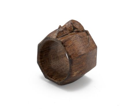 Robert Thompson, Mouseman of Kilburn, an octagonal napkin ring with a carved mouse signature, L5cm. 