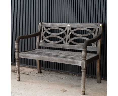 Royalcroft, a modern teak slated bench with pierced back design. 89cm H, 113cm L, 56cm W.