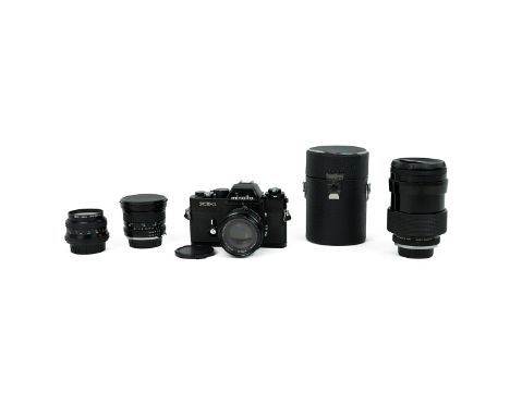 Minolta XE-1 camera and four lenses including a Vivitar series 1 35-85 1:2.8 and case and a Minolta MD W. ROKKOR 35MM 1:2.8 e