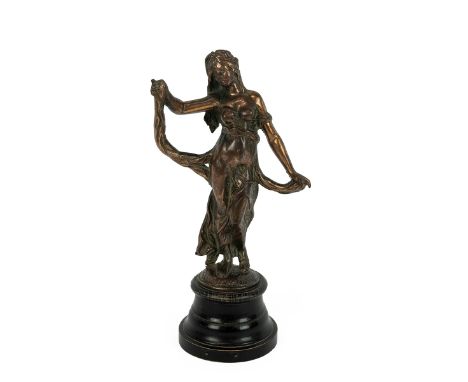 Late 19th century Art Nouveau bronze female figurine on an ebonised socle. H 30cm.