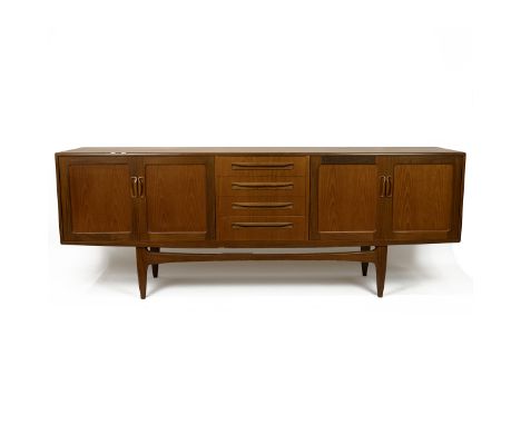 Vintage 1970's G plan teak sideboard. Four central drawers flanked by a cupboard either side. Adjustable shelf present but st