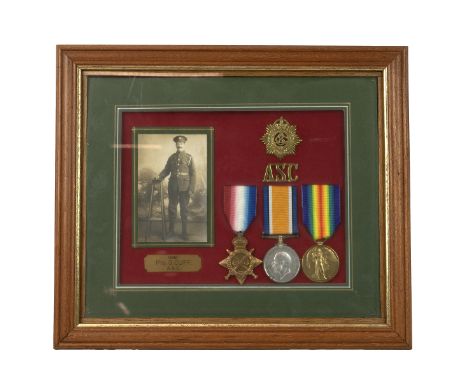 WWI medals awarded Private George Cuff, Army Service Corps, 12140, framed and glazed display.
