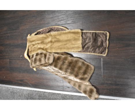 Two vintage faux fur wraps.