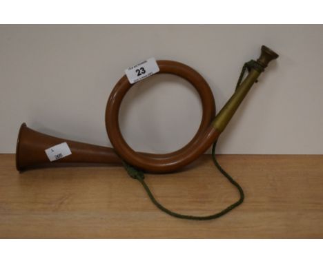 A vintage copper and brass post horn.