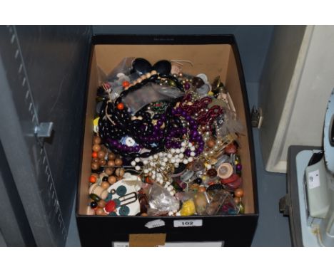 An assortment of vintage buttons and beads.