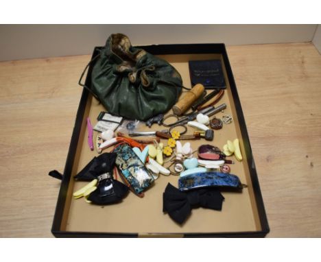 A miscellany of items, to include; antique needle cases, vintage hair clips and curios.