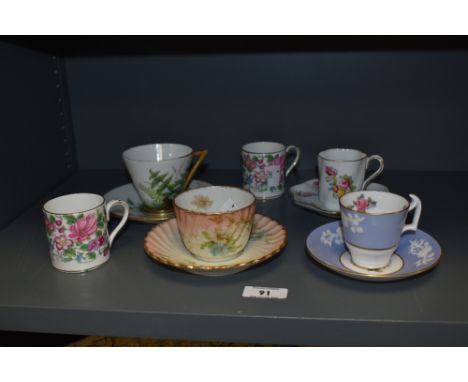 A selection of cabinet cups and saucers to include Victorian conical shaped example