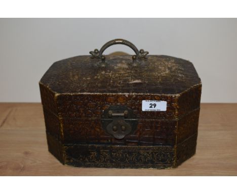 A vintage style jewellery case with brass handle and catch.