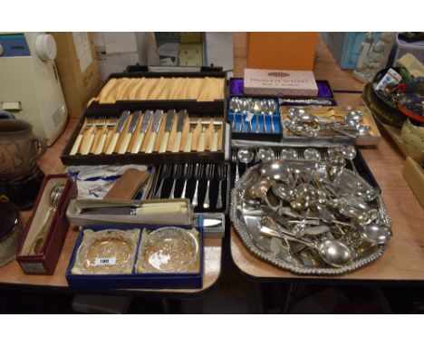 A mixed lot of vintage cutlery and flat ware, many in boxes, including cake forks, fish knives and forks and teaspoons.