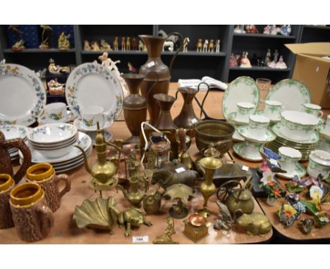 A mixed lot of vintage brass ornaments and four graduated copper jugs.