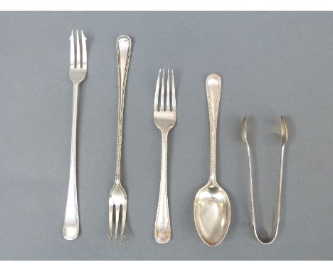 Five pieces of early 20thC hallmarked beaded edge cutlery, comprising two pickle forks, length 18.5cm, fork and spoon christe