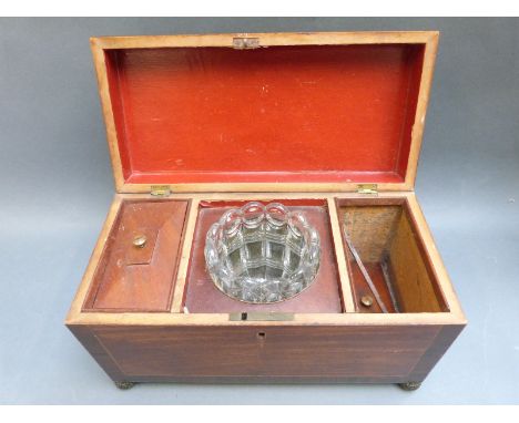 A 19thC tea caddy with metal feet and glass bowl to centre, width 30.5cm
