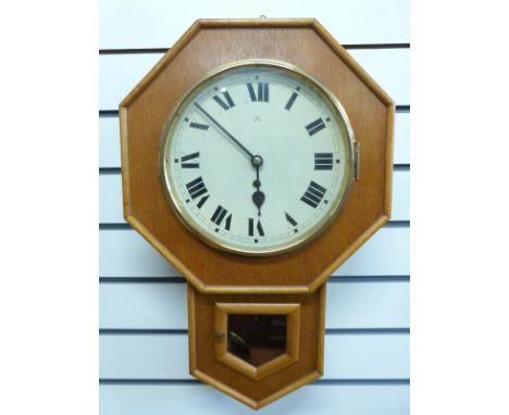 A light wood octagonal cased drop dial single train wall clock, by Ansonia clock company, the painted Roman dial with spade h