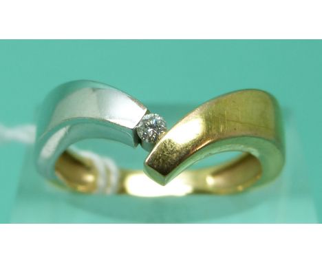 A 9ct bi-coloured gold ring set with a diamond (size M), weight 2.76g