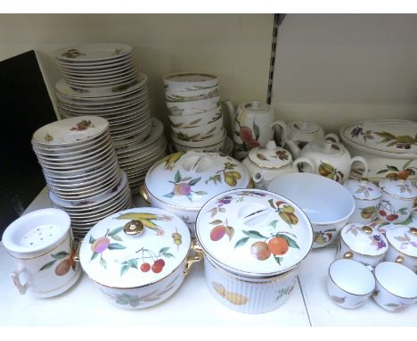 An extensive collection of Royal Worcester Evesham dinner, tea and oven ware including tureens, teapots, souffle and gratin d