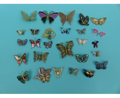 A collection of butterfly brooches to include enamel set, K and T, Monet, dual etc