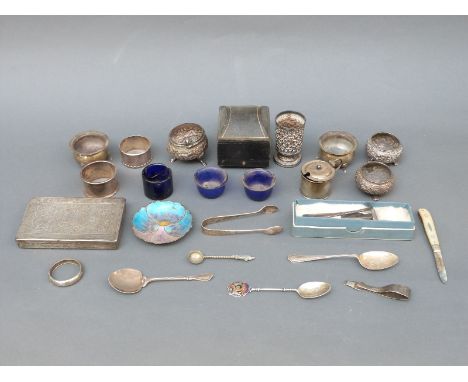 A quantity of hallmarked silver salts including some with blue glass liners, further silver cutlery, a silver enamel floral d