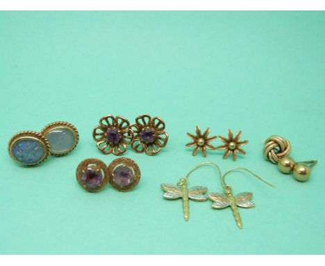 Two pairs of 9ct gold earrings set with amethysts, 9ct gold earrings set with faux opal and two 9ct gold pairs of studs etc