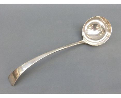A hallmarked silver ladle, London 1900, maker Josiah Williams and Co, also marked 'Waterhouse', 210g, length 32cm 