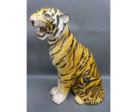 A ceramic fireside tiger cub, 58cm high
