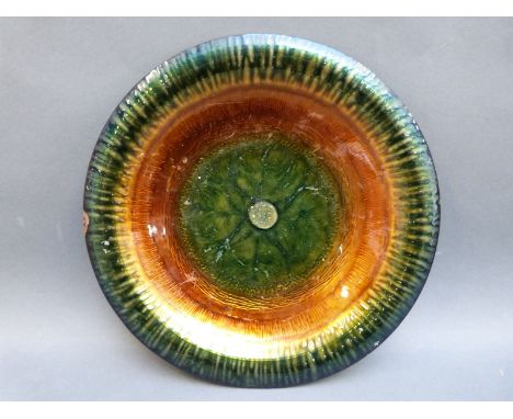 An enamel on copper charger, label verso Firenze 1967, diameter 30cm
