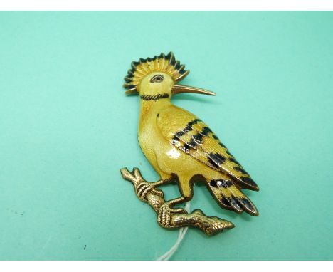 A silver gilt brooch in the form of a Hoopoe set with guilloche enamel