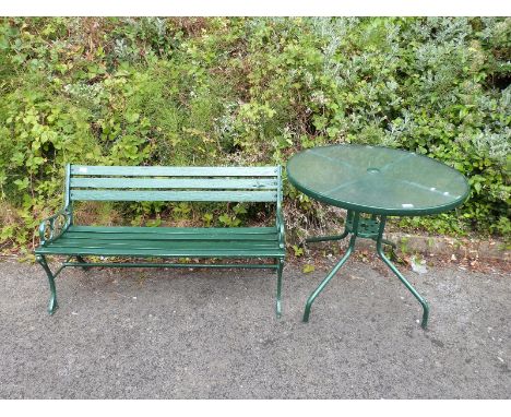 A garden bench (length 122cm) and a glass topped table (diameter 85cm)