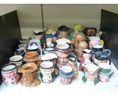 A collection of character and toby jugs by Midwinter, Sylvac, Wood, a Judy jug and Russian dolls