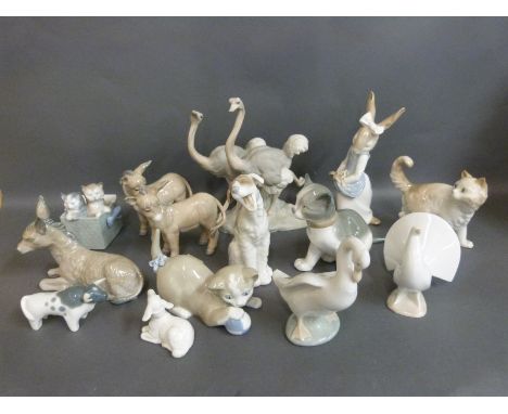 A collection of Nao animal figures including cats, donkeys and ostriches