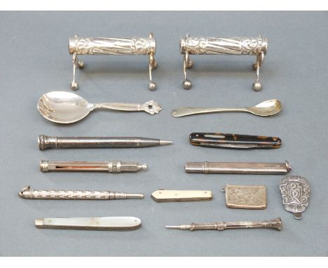 A pair of Edward VII hallmarked silver knife rests, B'ham 1902, maker Arthur Cook, Guild of Handicrafts, or George Henry Hart