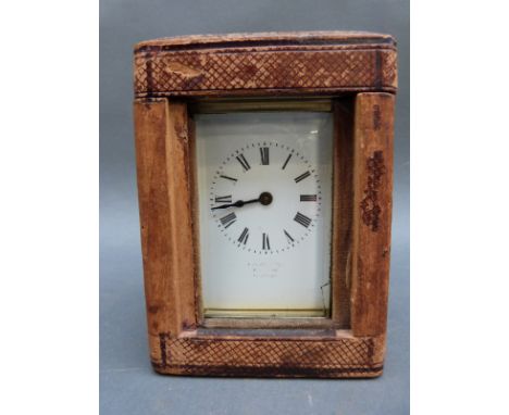 Lawson & Son, Brighton, brass corniche style carriage clock, enamelled Roman dial and blued steel hands, complete with carryi