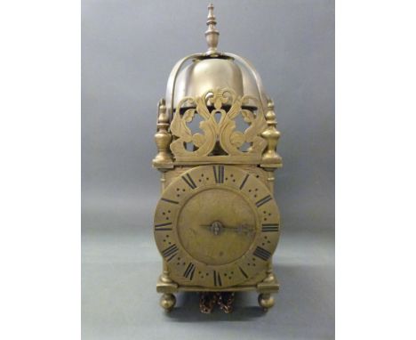 A 17th century style unsigned English lantern clock with hour striking movement, crown wheel escapement and single finger han
