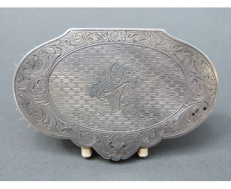 An unusual continental white metal compact, opening to reveal powder and space for lipstick, width 9.5cm 