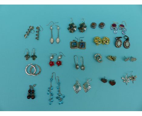 A collection of 20 pairs of silver earrings including pearl, glass, etc 